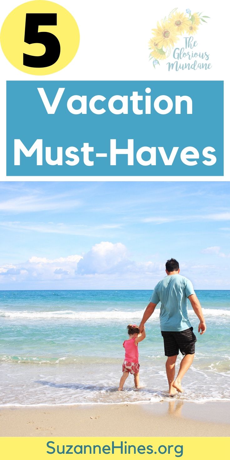 Dad and girl on beach, 5 Vacation Must-Haves